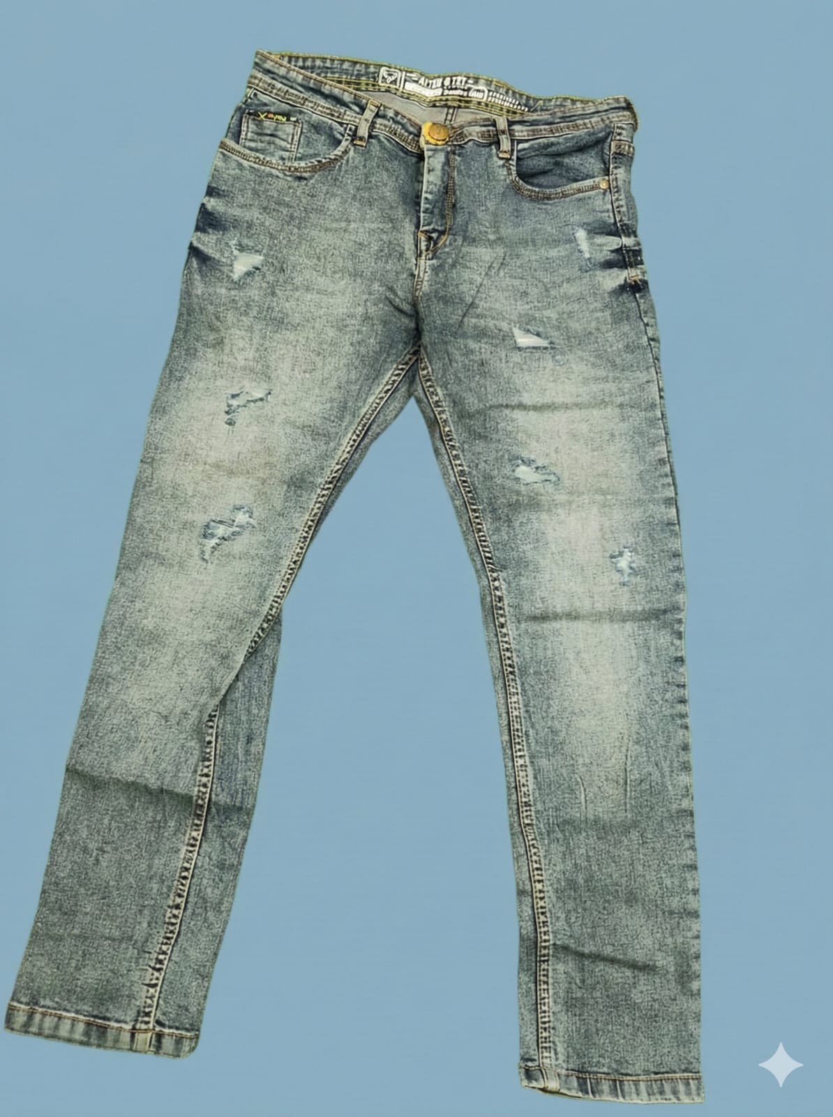 Distressed blue jeans